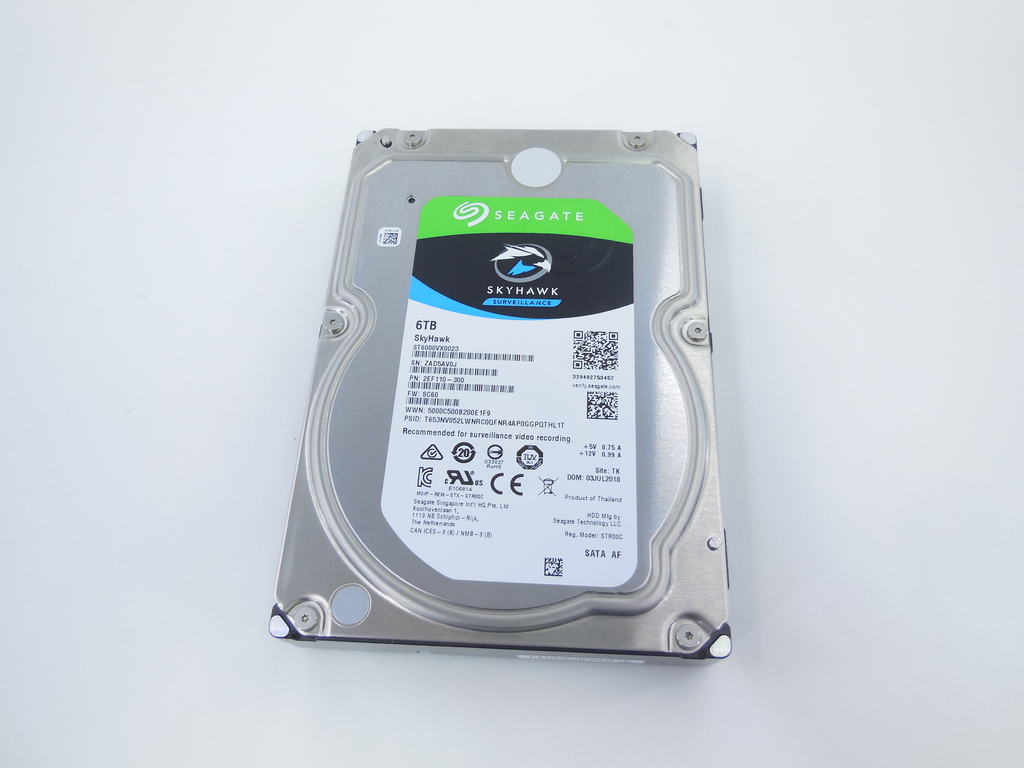 Seagate sata 6gb s. Упаковка жесткого диска Сигейт. SATA жесткий диск задняя сторона. St6000nm0115 Seagate фото.